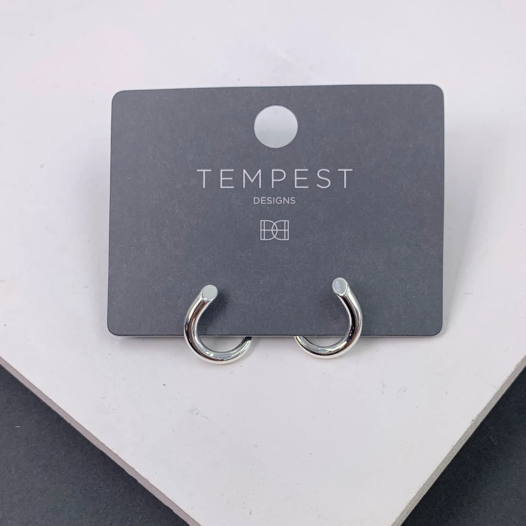 Contemporary twisted tube effect earrings