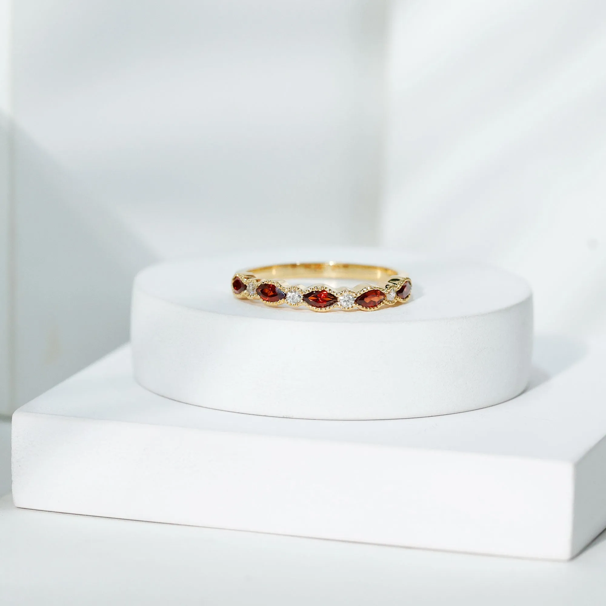 East West Half Eternity Ring with Marquise Cut Garnet and Diamond