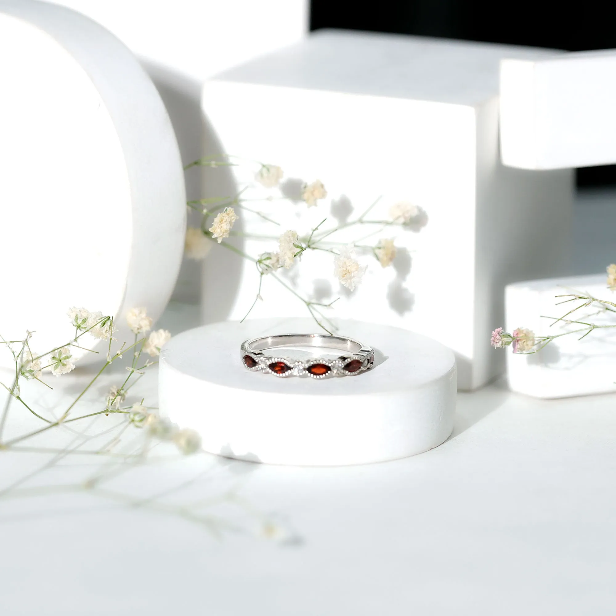 East West Half Eternity Ring with Marquise Cut Garnet and Diamond