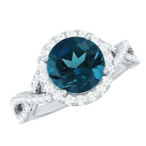 London Blue Topaz Crossover Ring with Diamond Halo