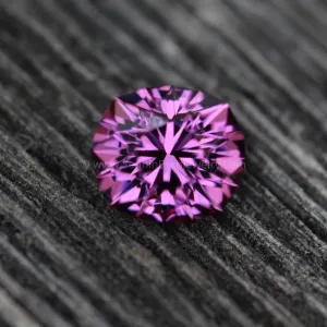 Mahenge Garnet 6.7x5.9mm, 1.27 carats - Precision Cut Garnet - Oval Garnet - Pink Garnet - Intense Garnet