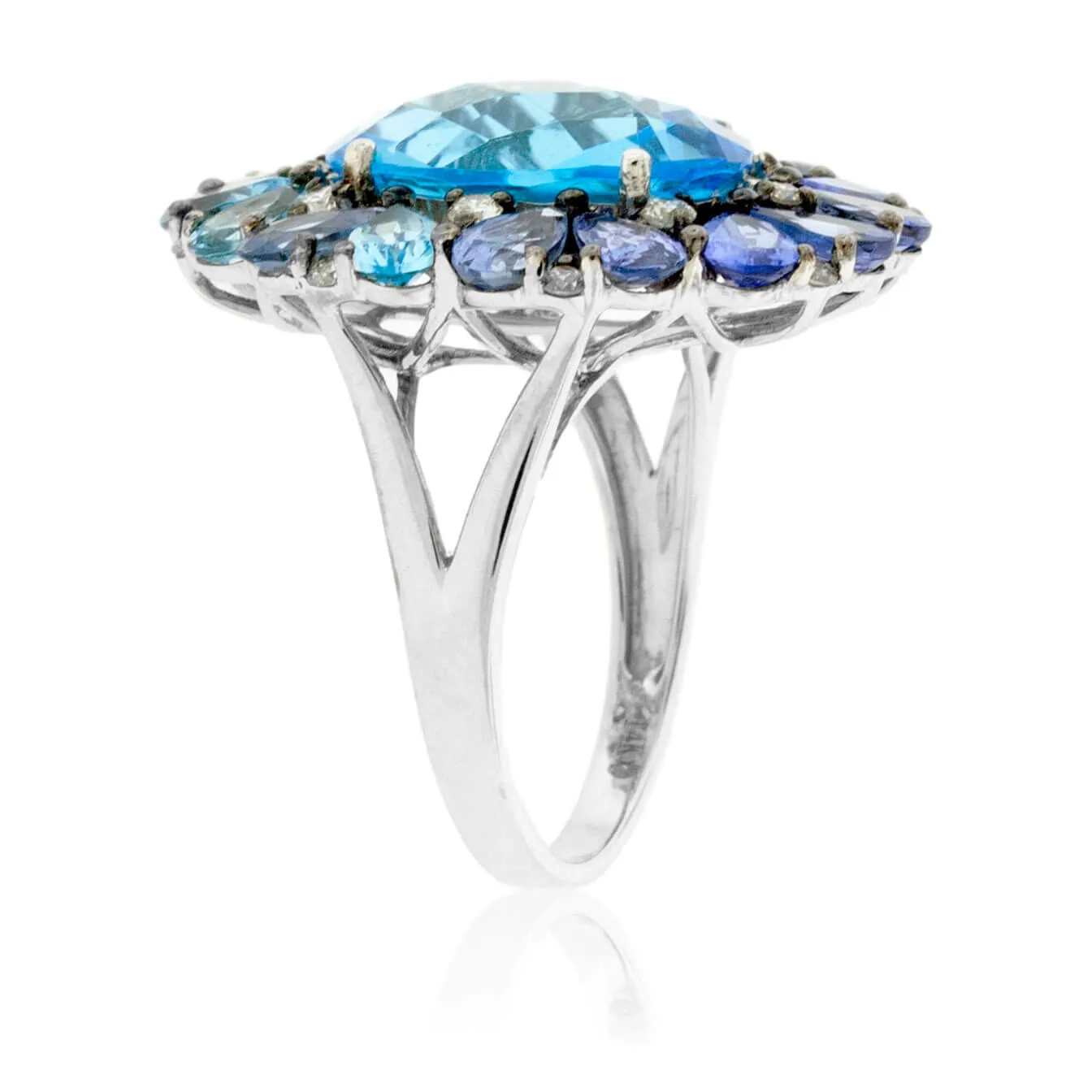 Oval Blue Topaz with Pear Tanzanite & Sapphire Halo Ring