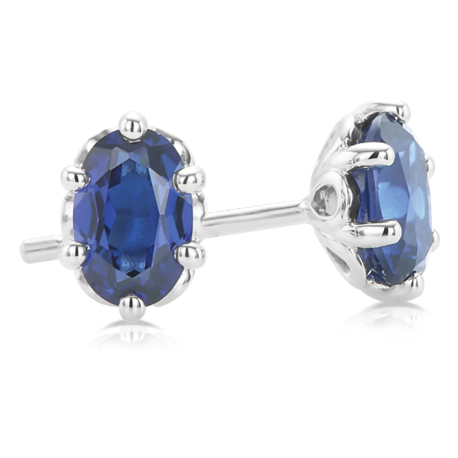 Sterling Silver 6x4mm Oval Cut Created Sapphire Stud Earrings