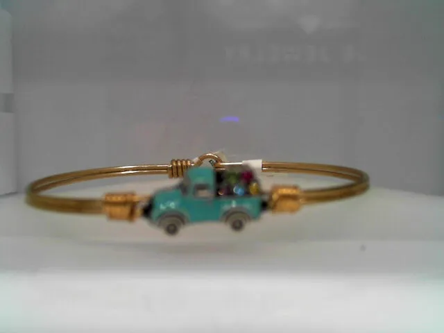 VINTAGE SPRING TRUCK BANGLE BR